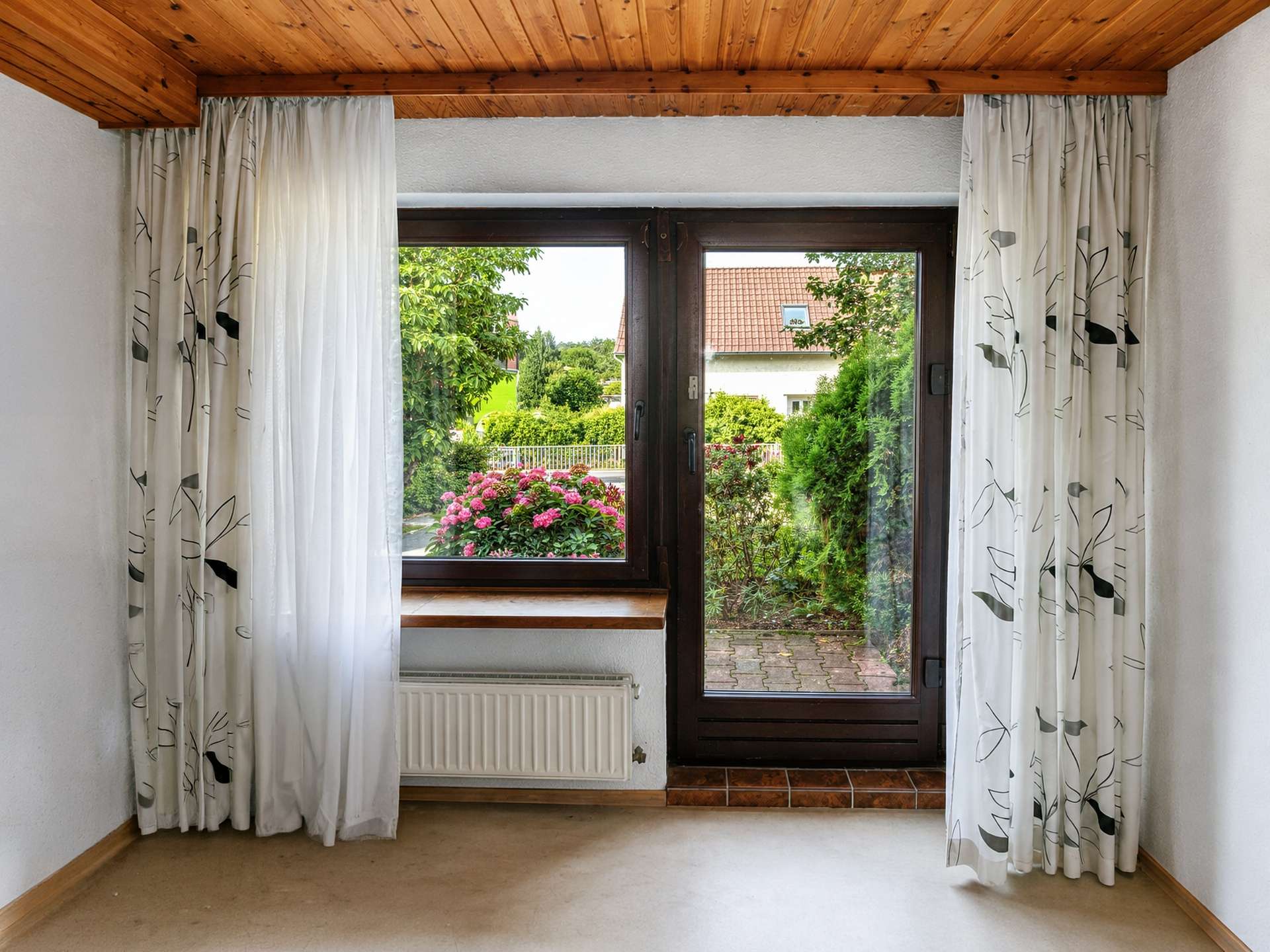 Einliegerwohnung Raum I Gartenblick